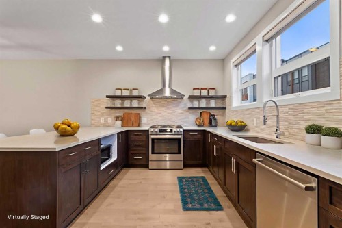 62 Norford Common Nw, Calgary, AB - Indoor Photo Showing Kitchen With Stainless Steel Kitchen With Upgraded Kitchen