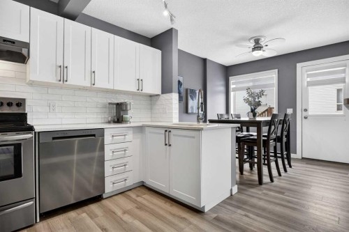 237 Willowbrook Close Nw, Airdrie, AB - Indoor Photo Showing Kitchen With Stainless Steel Kitchen With Upgraded Kitchen