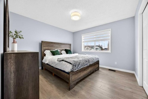 237 Willowbrook Close Nw, Airdrie, AB - Indoor Photo Showing Bedroom