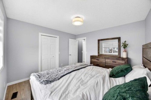 237 Willowbrook Close Nw, Airdrie, AB - Indoor Photo Showing Bedroom