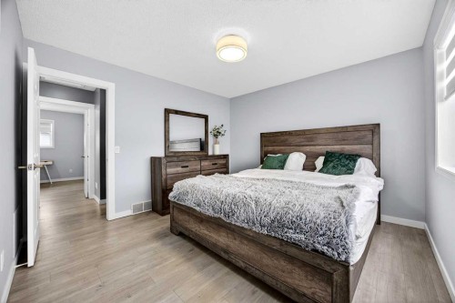 237 Willowbrook Close Nw, Airdrie, AB - Indoor Photo Showing Bedroom