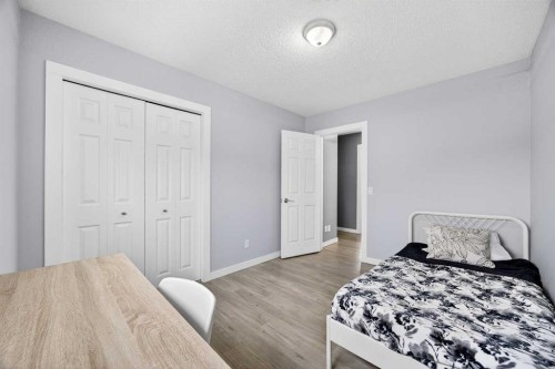237 Willowbrook Close Nw, Airdrie, AB - Indoor Photo Showing Bedroom
