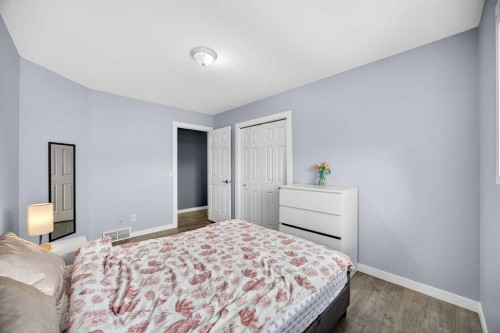 237 Willowbrook Close Nw, Airdrie, AB - Indoor Photo Showing Bedroom