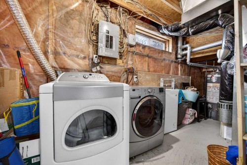 237 Willowbrook Close Nw, Airdrie, AB - Indoor Photo Showing Laundry Room