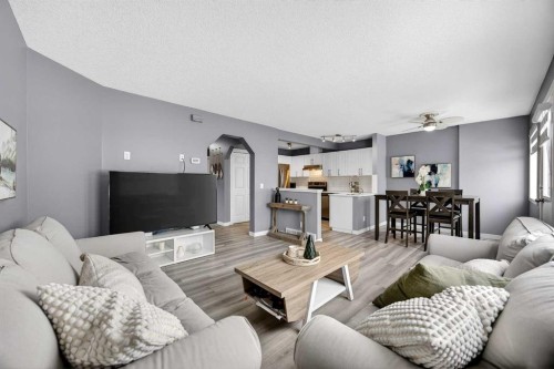 237 Willowbrook Close Nw, Airdrie, AB - Indoor Photo Showing Living Room