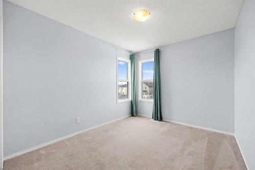 69 Everglen Way Sw, Calgary, AB - Indoor Photo Showing Other Room