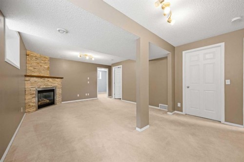 69 Everglen Way Sw, Calgary, AB - Indoor With Fireplace