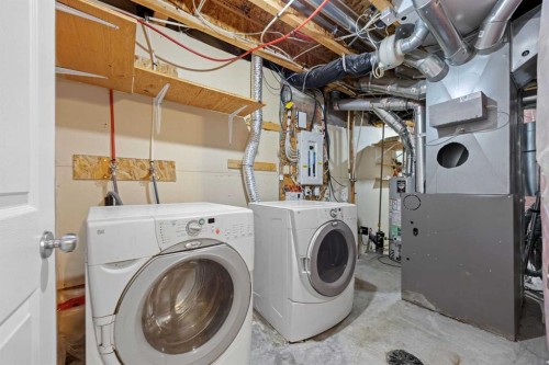 69 Everglen Way Sw, Calgary, AB - Indoor Photo Showing Laundry Room