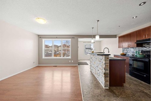 69 Everglen Way Sw, Calgary, AB - Indoor Photo Showing Kitchen With Upgraded Kitchen