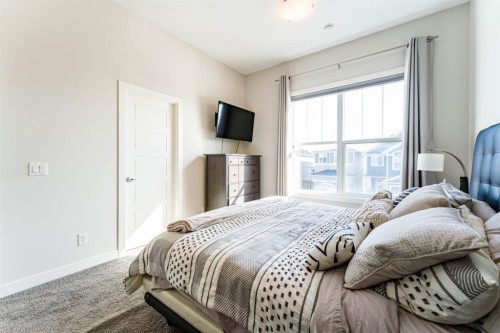 5 Sage Bluff Heights Nw, Calgary, AB - Indoor Photo Showing Bedroom