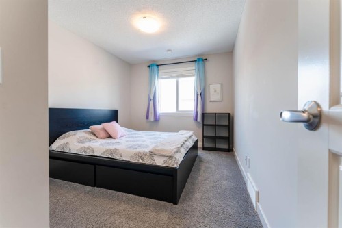 5 Sage Bluff Heights Nw, Calgary, AB - Indoor Photo Showing Bedroom
