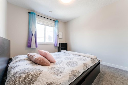 5 Sage Bluff Heights Nw, Calgary, AB - Indoor Photo Showing Bedroom