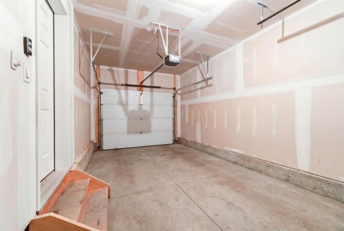 5 Sage Bluff Heights Nw, Calgary, AB - Indoor Photo Showing Garage