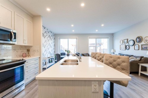 5 Sage Bluff Heights Nw, Calgary, AB - Indoor Photo Showing Kitchen With Double Sink With Upgraded Kitchen