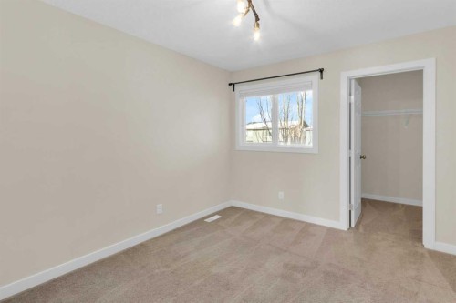26 Willow Drive, Cochrane, AB - Indoor Photo Showing Other Room