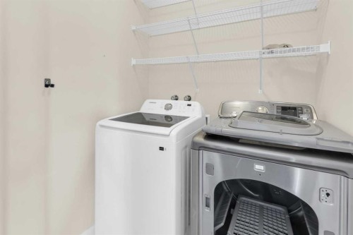 26 Willow Drive, Cochrane, AB - Indoor Photo Showing Laundry Room