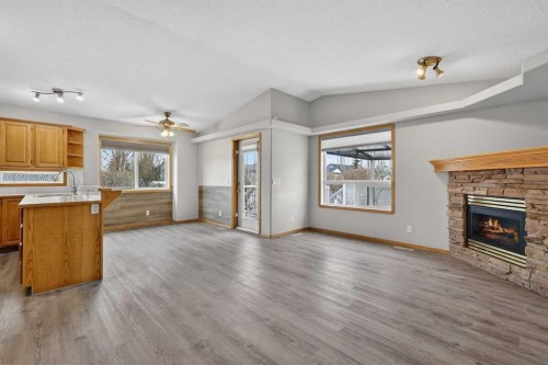 106 Cambridge Glen Drive, Strathmore, AB - Indoor Photo Showing Living Room With Fireplace