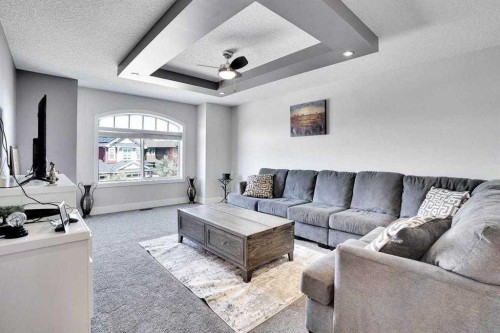 172 Kinniburgh Way, Chestermere, AB - Indoor Photo Showing Living Room