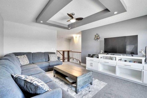 172 Kinniburgh Way, Chestermere, AB - Indoor Photo Showing Living Room