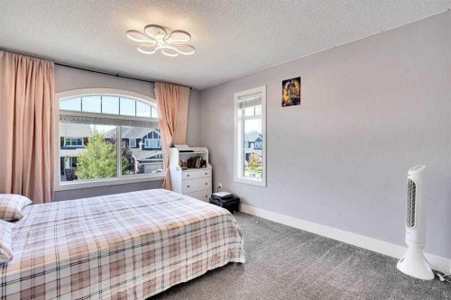 172 Kinniburgh Way, Chestermere, AB - Indoor Photo Showing Bedroom