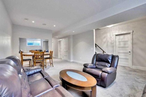 172 Kinniburgh Way, Chestermere, AB - Indoor Photo Showing Living Room
