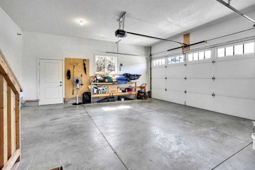 172 Kinniburgh Way, Chestermere, AB - Indoor Photo Showing Garage