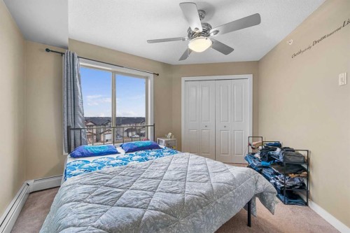409-5 Saddlestone Way Ne, Calgary, AB - Indoor Photo Showing Bedroom