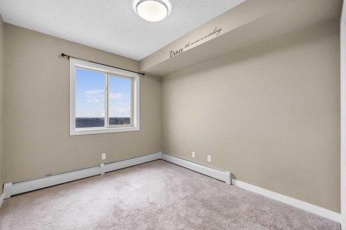 409-5 Saddlestone Way Ne, Calgary, AB - Indoor Photo Showing Other Room