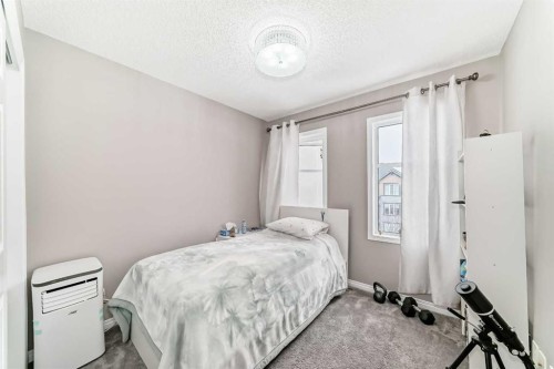 127 Windford Gardens Sw, Airdrie, AB - Indoor Photo Showing Bedroom