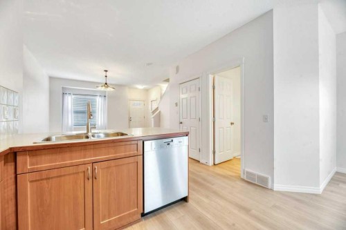 109 Ranch Ridge Meadow, Strathmore, AB - Indoor Photo Showing Kitchen With Double Sink