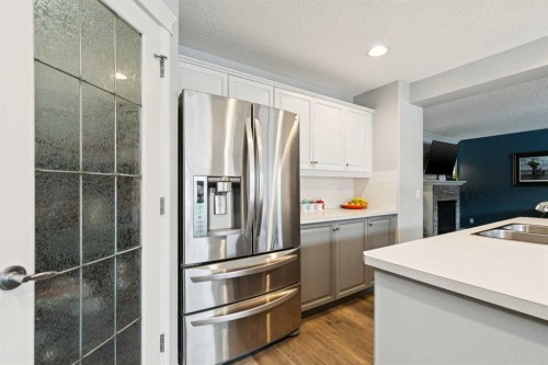 54 Chapala Grove Se, Calgary, AB - Indoor Photo Showing Kitchen With Double Sink