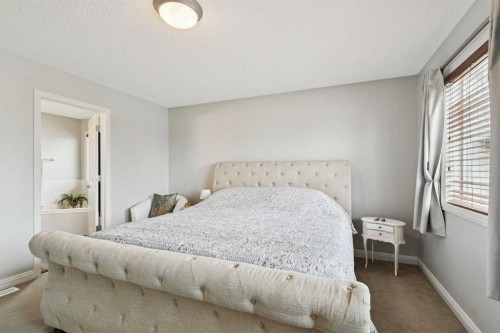 54 Chapala Grove Se, Calgary, AB - Indoor Photo Showing Bedroom