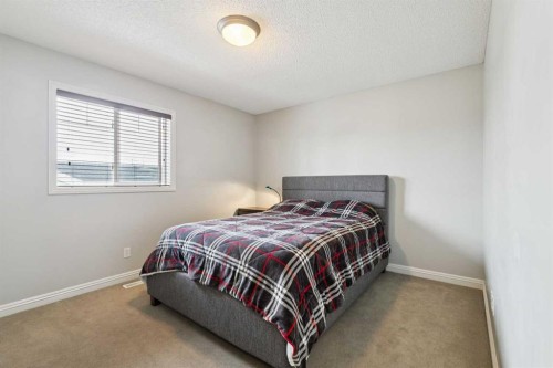 54 Chapala Grove Se, Calgary, AB - Indoor Photo Showing Bedroom