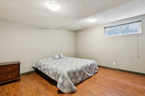 54 Chapala Grove Se, Calgary, AB - Indoor Photo Showing Bedroom