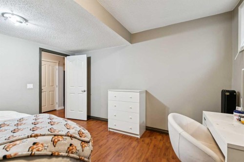 54 Chapala Grove Se, Calgary, AB - Indoor Photo Showing Bedroom