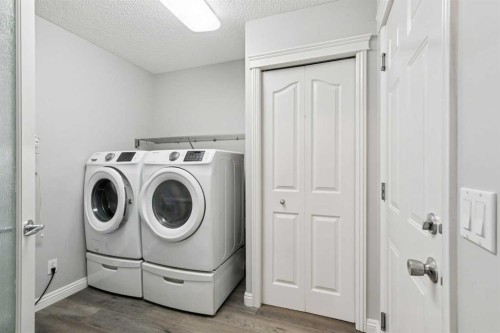 54 Chapala Grove Se, Calgary, AB - Indoor Photo Showing Laundry Room
