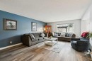 54 Chapala Grove Se, Calgary, AB  - Indoor Photo Showing Living Room 