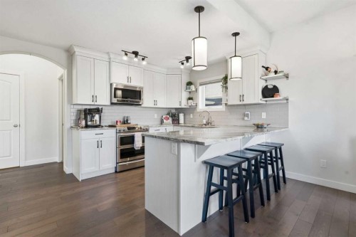 99 Valarosa Drive, Didsbury, AB - Indoor Photo Showing Kitchen With Upgraded Kitchen