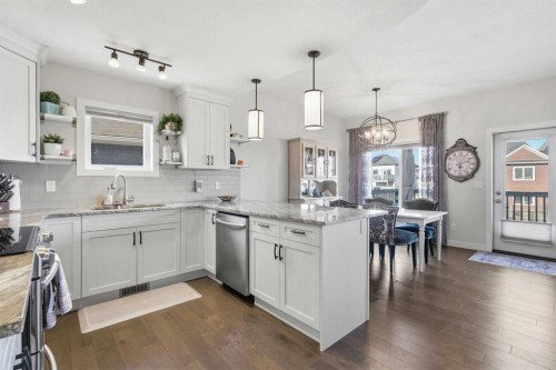 99 Valarosa Drive, Didsbury, AB - Indoor Photo Showing Kitchen With Upgraded Kitchen