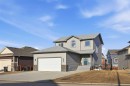 99 Valarosa Drive, Didsbury, AB  - Outdoor With Facade 