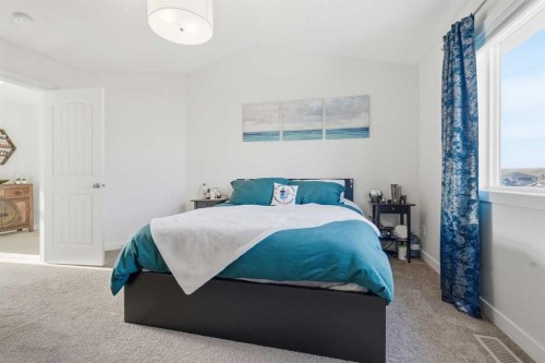 99 Valarosa Drive, Didsbury, AB - Indoor Photo Showing Bedroom