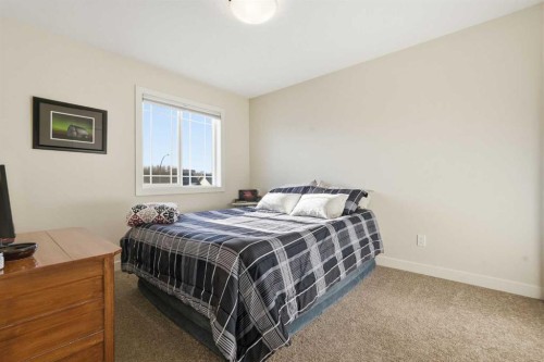 99 Valarosa Drive, Didsbury, AB - Indoor Photo Showing Bedroom