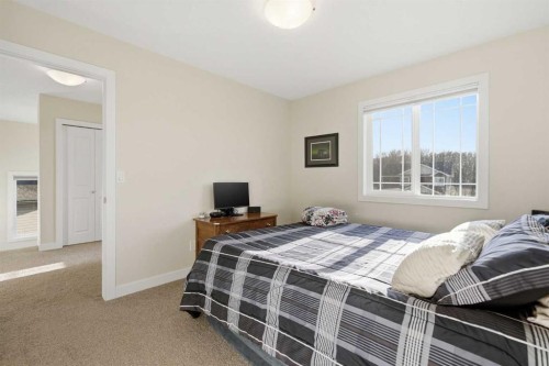 99 Valarosa Drive, Didsbury, AB - Indoor Photo Showing Bedroom