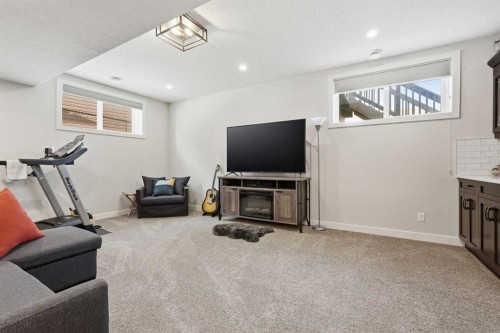 99 Valarosa Drive, Didsbury, AB - Indoor Photo Showing Gym Room