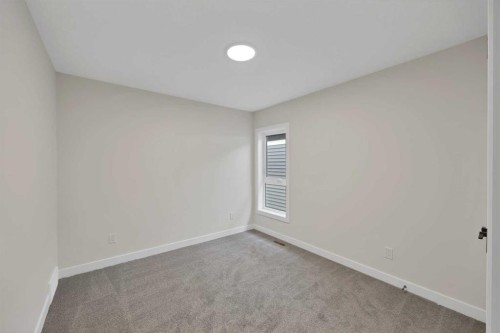 191 Homestead Common Ne, Calgary, AB - Indoor Photo Showing Other Room