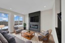 191 Homestead Common Ne, Calgary, AB  - Indoor Photo Showing Living Room With Fireplace 
