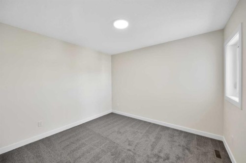 191 Homestead Common Ne, Calgary, AB - Indoor Photo Showing Other Room