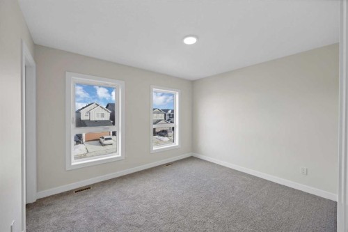 191 Homestead Common Ne, Calgary, AB - Indoor Photo Showing Other Room