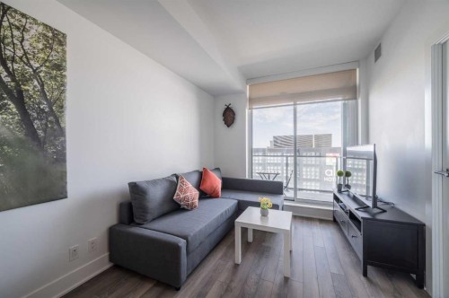 1205-550 Riverfront Avenue Se, Calgary, AB - Indoor Photo Showing Living Room