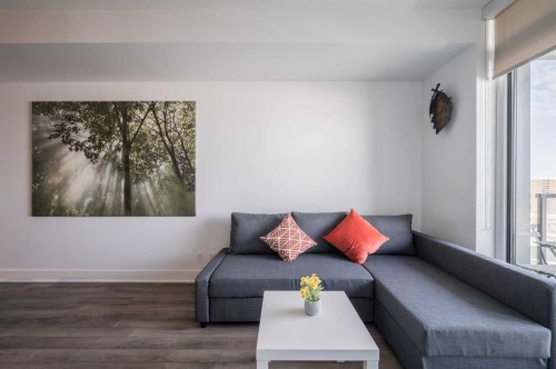 1205-550 Riverfront Avenue Se, Calgary, AB - Indoor Photo Showing Living Room